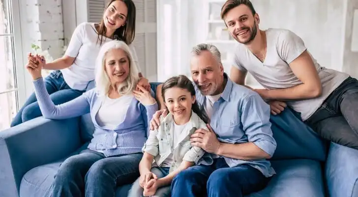the-big-happy-family-sitting-on-the-sofa-picture-id986709280