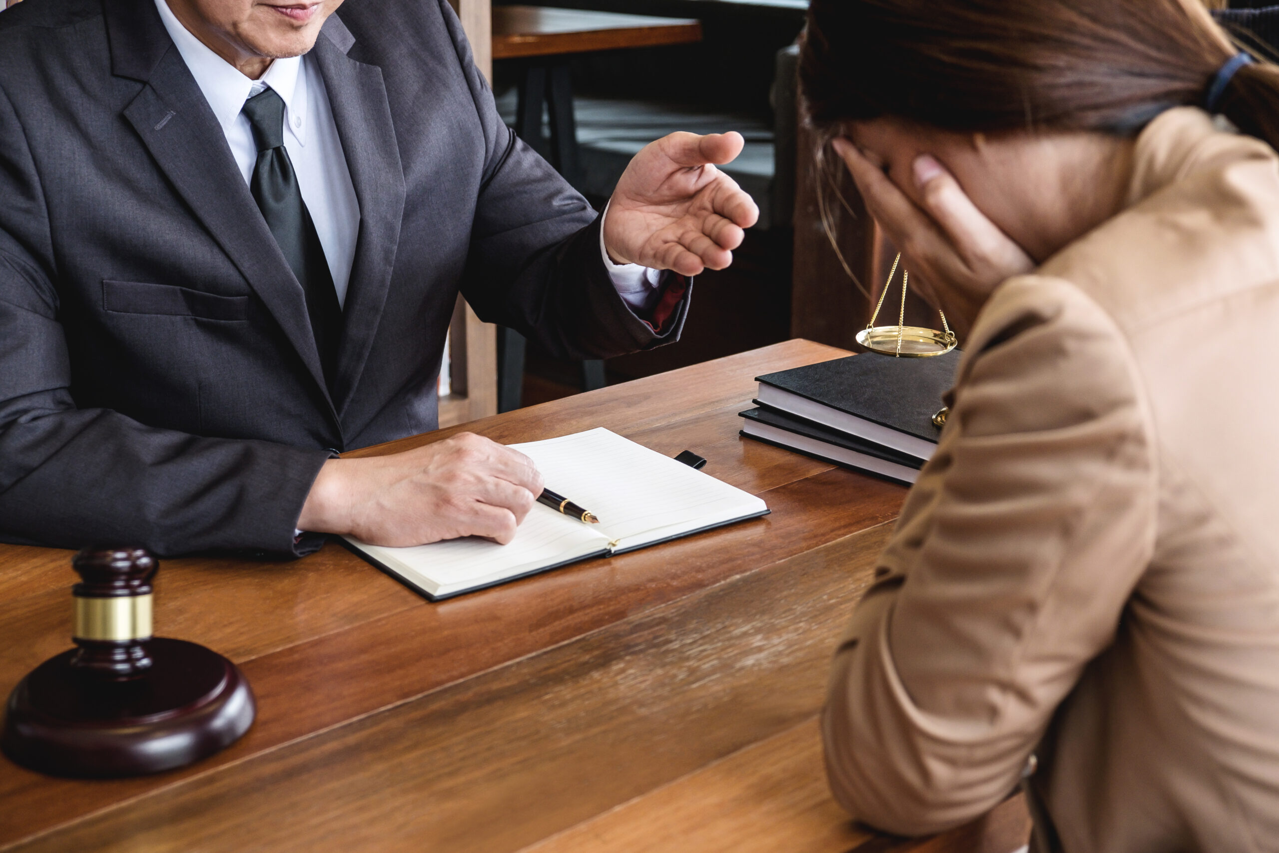 troubled-woman-with-attorney-in-office-2026-03-26-04-53-23-utc